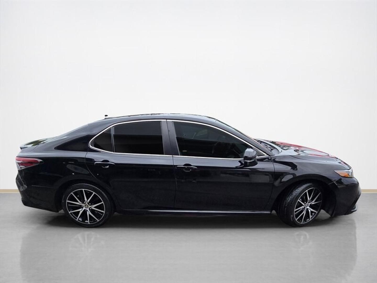 2023 Midnight Black Metallic Toyota Camry Hybrid SE (4T1S31AK5PU) with an 2.5L Hybrid I4 208hp engine, Automatic transmission, located at 25355 Eames Street, Channahon, IL, 60410, (815) 467-1807, 41.429108, -88.228432 - The 2023 Toyota Camry Hybrid SE combines efficiency, performance, and modern design in a sleek Black exterior with a matching Black interior. Powered by a 2.5L Hybrid I4 engine delivering 208 horsepower, this sedan offers an impressive fuel economy of 44 MPG in the city and 47 MPG on the highway, ma- Photo#1