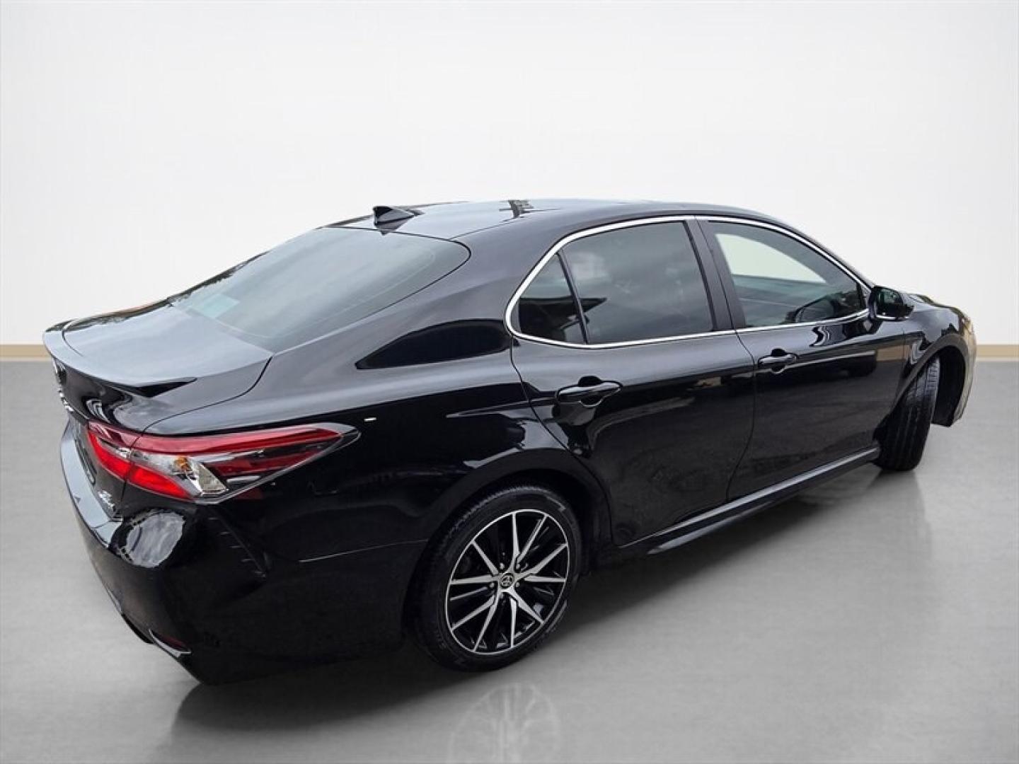 2023 Midnight Black Metallic Toyota Camry Hybrid SE (4T1S31AK5PU) with an 2.5L Hybrid I4 208hp engine, Automatic transmission, located at 25355 Eames Street, Channahon, IL, 60410, (815) 467-1807, 41.429108, -88.228432 - The 2023 Toyota Camry Hybrid SE combines efficiency, performance, and modern design in a sleek Black exterior with a matching Black interior. Powered by a 2.5L Hybrid I4 engine delivering 208 horsepower, this sedan offers an impressive fuel economy of 44 MPG in the city and 47 MPG on the highway, ma- Photo#3
