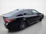 2023 Midnight Black Metallic Toyota Camry Hybrid SE (4T1S31AK5PU) with an 2.5L Hybrid I4 208hp engine, Automatic transmission, located at 25355 Eames Street, Channahon, IL, 60410, (815) 467-1807, 41.429108, -88.228432 - The 2023 Toyota Camry Hybrid SE combines efficiency, performance, and modern design in a sleek Black exterior with a matching Black interior. Powered by a 2.5L Hybrid I4 engine delivering 208 horsepower, this sedan offers an impressive fuel economy of 44 MPG in the city and 47 MPG on the highway, ma- Photo#3