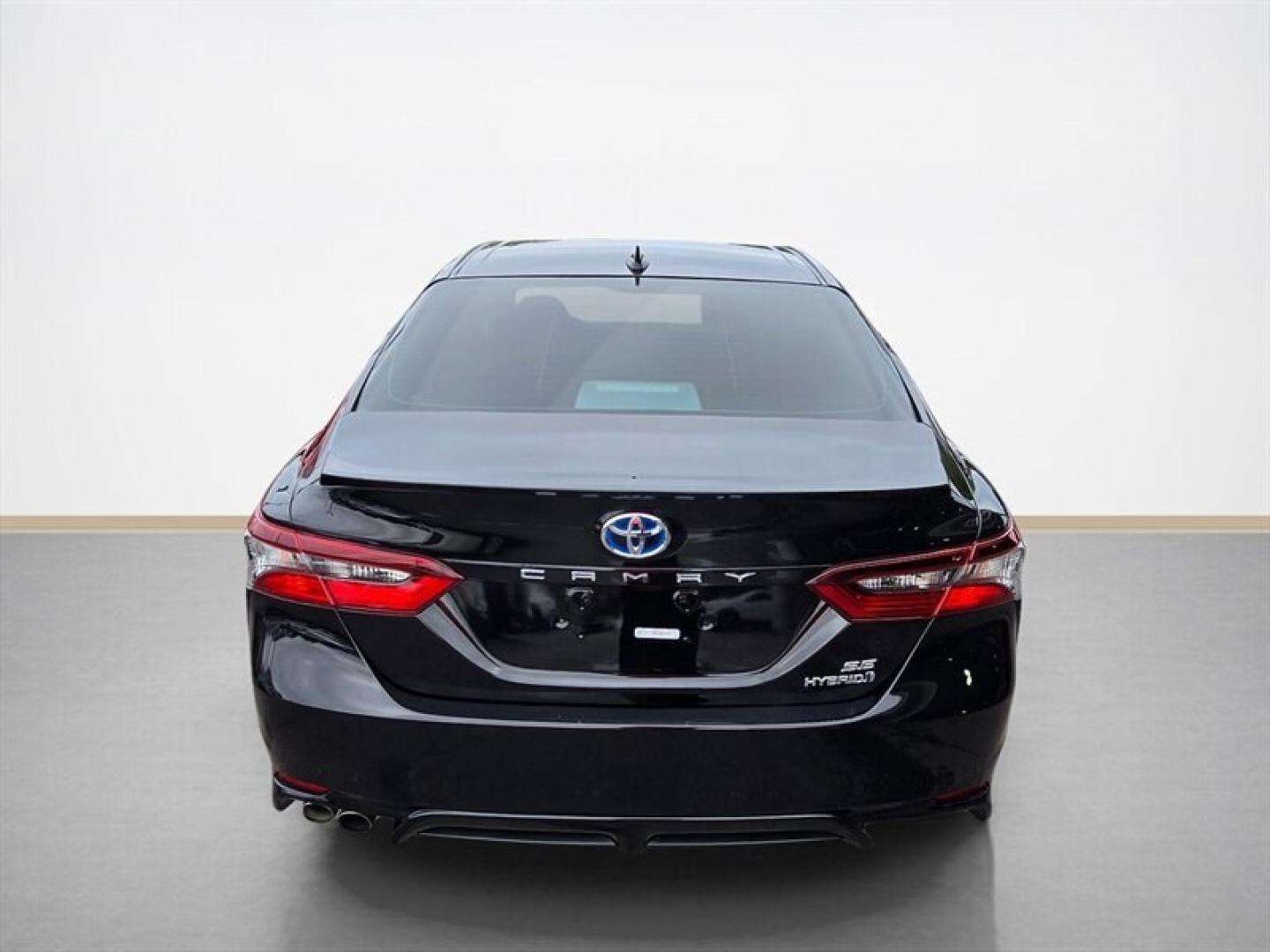 2023 Midnight Black Metallic Toyota Camry Hybrid SE (4T1S31AK5PU) with an 2.5L Hybrid I4 208hp engine, Automatic transmission, located at 25355 Eames Street, Channahon, IL, 60410, (815) 467-1807, 41.429108, -88.228432 - The 2023 Toyota Camry Hybrid SE combines efficiency, performance, and modern design in a sleek Black exterior with a matching Black interior. Powered by a 2.5L Hybrid I4 engine delivering 208 horsepower, this sedan offers an impressive fuel economy of 44 MPG in the city and 47 MPG on the highway, ma- Photo#4