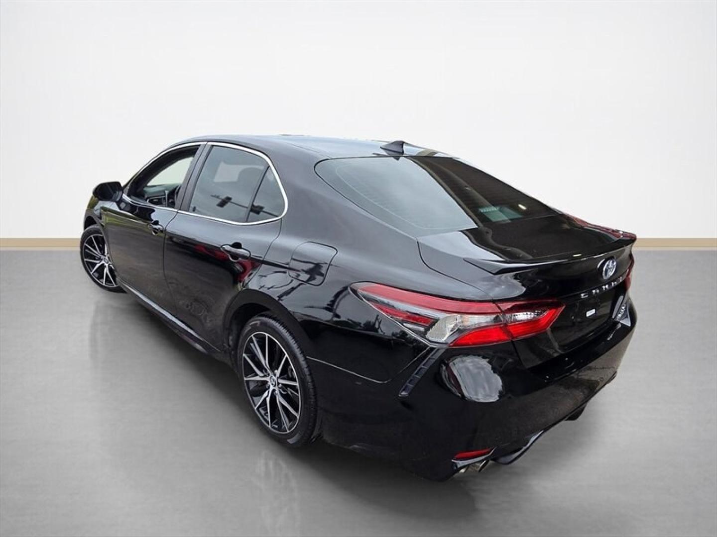 2023 Midnight Black Metallic Toyota Camry Hybrid SE (4T1S31AK5PU) with an 2.5L Hybrid I4 208hp engine, Automatic transmission, located at 25355 Eames Street, Channahon, IL, 60410, (815) 467-1807, 41.429108, -88.228432 - The 2023 Toyota Camry Hybrid SE combines efficiency, performance, and modern design in a sleek Black exterior with a matching Black interior. Powered by a 2.5L Hybrid I4 engine delivering 208 horsepower, this sedan offers an impressive fuel economy of 44 MPG in the city and 47 MPG on the highway, ma- Photo#5