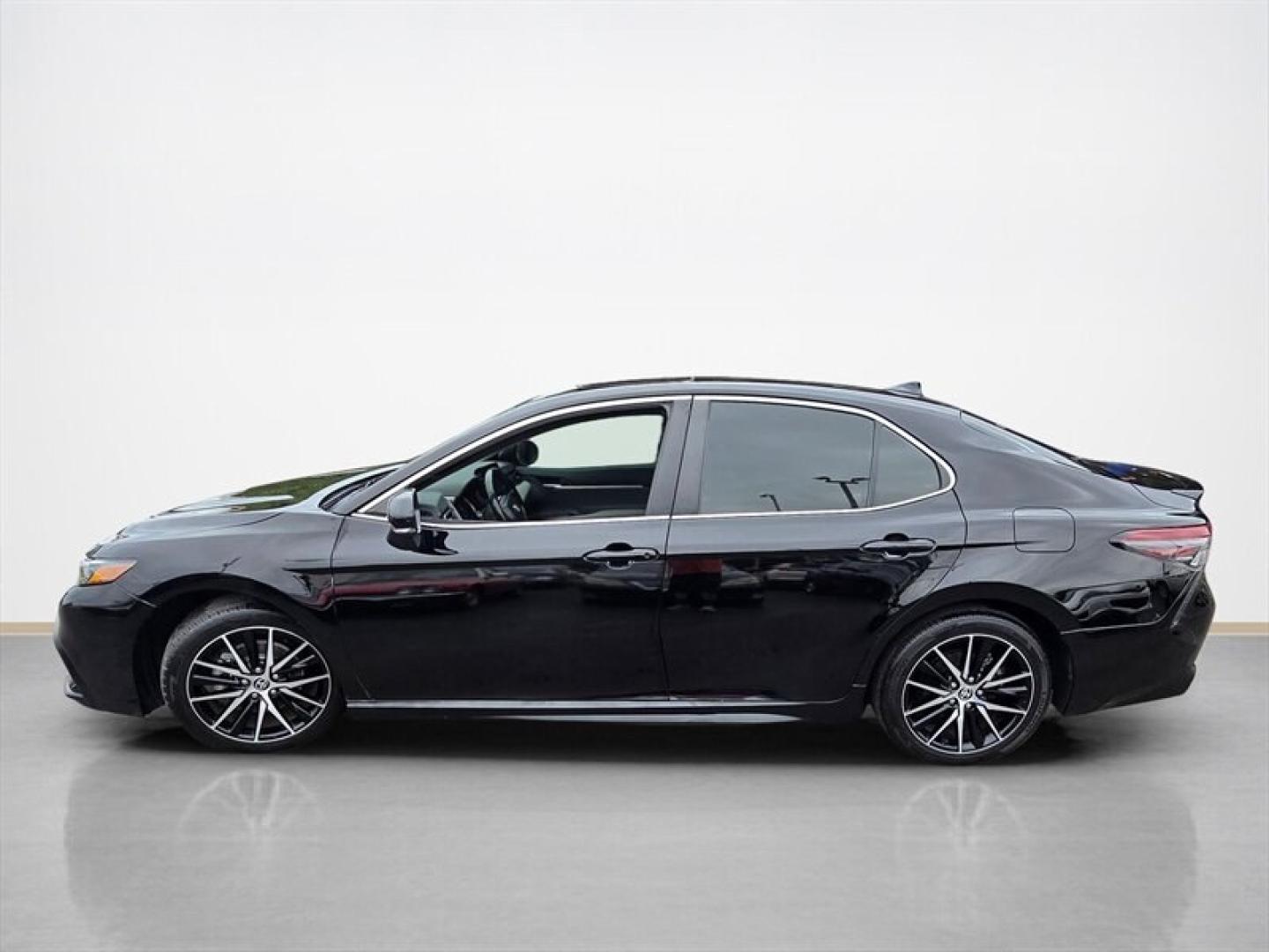2023 Midnight Black Metallic Toyota Camry Hybrid SE (4T1S31AK5PU) with an 2.5L Hybrid I4 208hp engine, Automatic transmission, located at 25355 Eames Street, Channahon, IL, 60410, (815) 467-1807, 41.429108, -88.228432 - The 2023 Toyota Camry Hybrid SE combines efficiency, performance, and modern design in a sleek Black exterior with a matching Black interior. Powered by a 2.5L Hybrid I4 engine delivering 208 horsepower, this sedan offers an impressive fuel economy of 44 MPG in the city and 47 MPG on the highway, ma- Photo#6