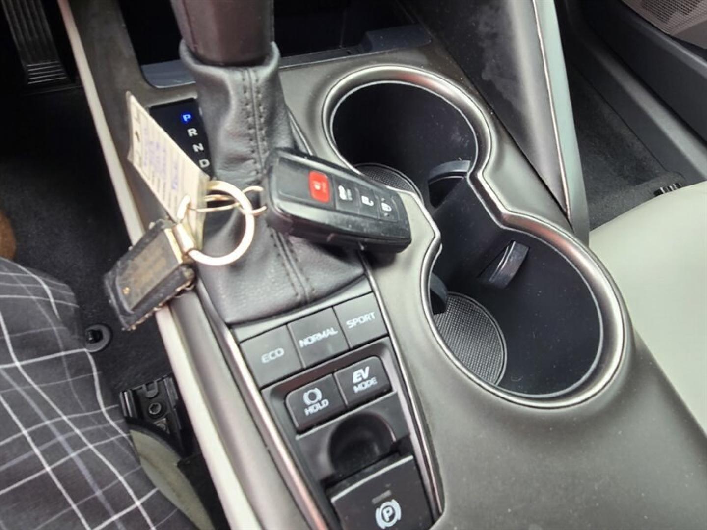 2023 Midnight Black Metallic Toyota Camry Hybrid SE (4T1S31AK5PU) with an 2.5L Hybrid I4 208hp engine, Automatic transmission, located at 25355 Eames Street, Channahon, IL, 60410, (815) 467-1807, 41.429108, -88.228432 - The 2023 Toyota Camry Hybrid SE combines efficiency, performance, and modern design in a sleek Black exterior with a matching Black interior. Powered by a 2.5L Hybrid I4 engine delivering 208 horsepower, this sedan offers an impressive fuel economy of 44 MPG in the city and 47 MPG on the highway, ma- Photo#22