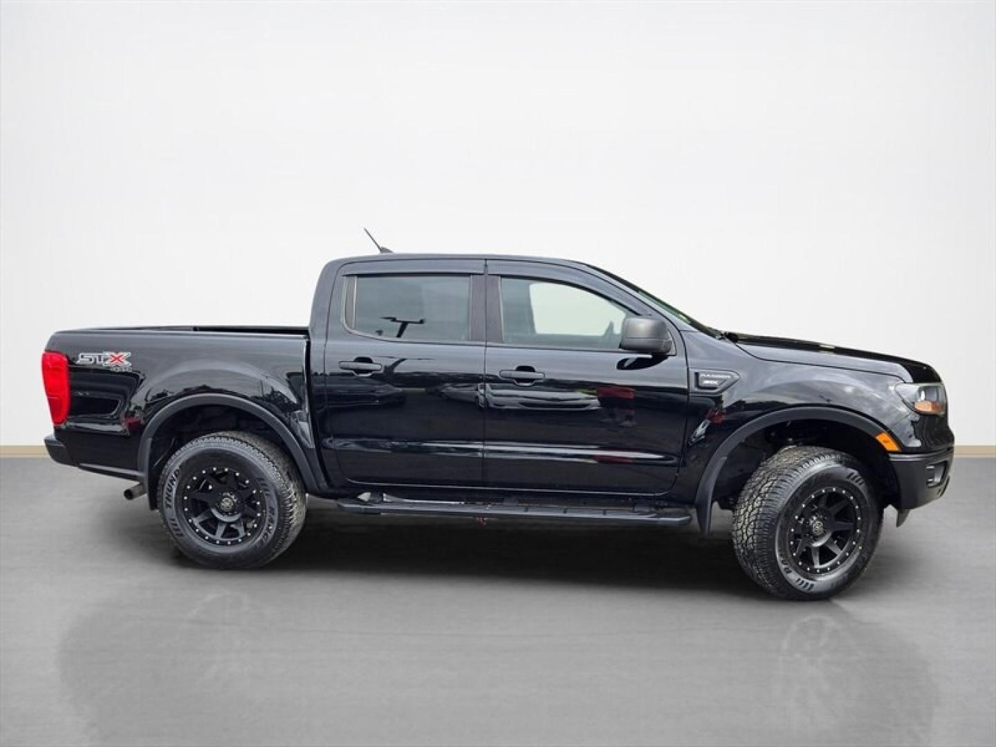 2019 Shadow Black Ford Ranger XL (1FTER4FH1KL) with an EcoBoost 2.3L Turbo I4 270hp 310ft. lbs. engine, Automatic transmission, located at 25355 Eames Street, Channahon, IL, 60410, (815) 467-1807, 41.429108, -88.228432 - The 2019 Ford Ranger XL is a midsize pickup truck equipped with a powerful EcoBoost 2.3L Turbocharged I4 engine, delivering 270 horsepower and 310 ft-lbs of torque. This model comes in a sleek black exterior complemented by a matching black interior, offering a cohesive and modern appearance. Desig- Photo#1