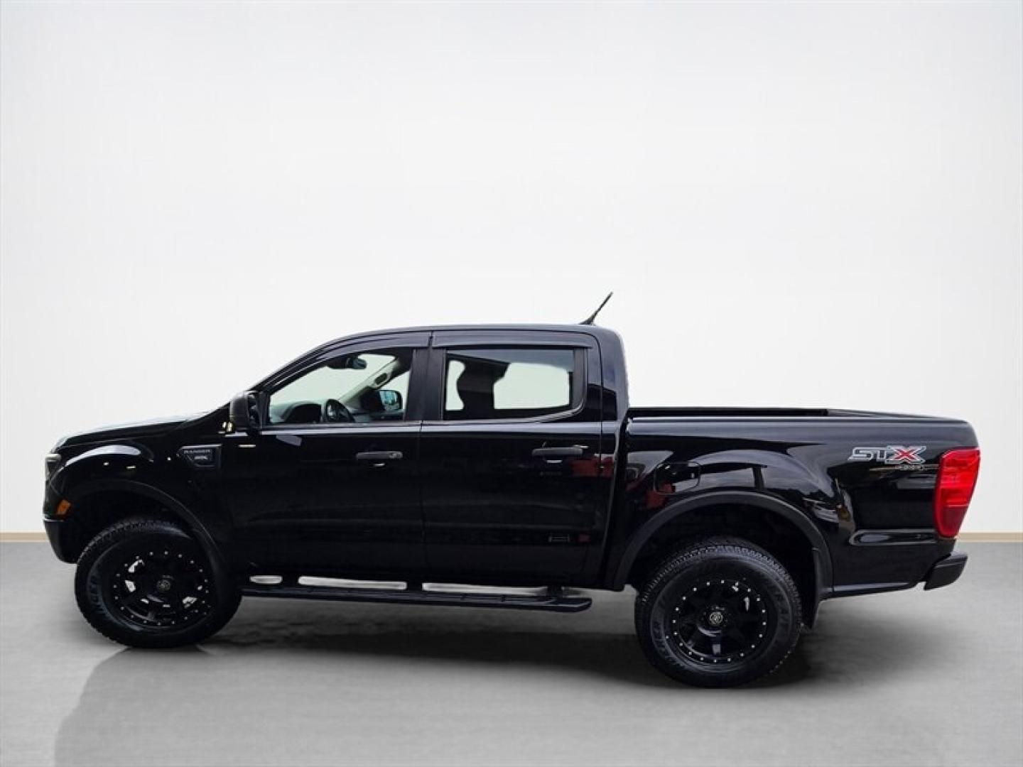 2019 Shadow Black Ford Ranger XL (1FTER4FH1KL) with an EcoBoost 2.3L Turbo I4 270hp 310ft. lbs. engine, Automatic transmission, located at 25355 Eames Street, Channahon, IL, 60410, (815) 467-1807, 41.429108, -88.228432 - The 2019 Ford Ranger XL is a midsize pickup truck equipped with a powerful EcoBoost 2.3L Turbocharged I4 engine, delivering 270 horsepower and 310 ft-lbs of torque. This model comes in a sleek black exterior complemented by a matching black interior, offering a cohesive and modern appearance. Desig- Photo#6