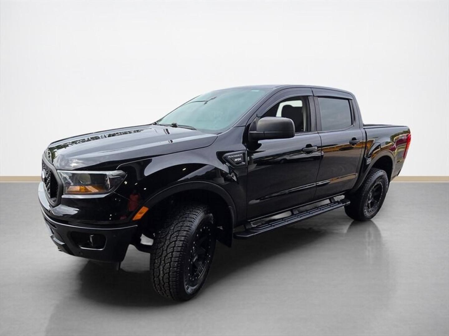 2019 Shadow Black Ford Ranger XL (1FTER4FH1KL) with an EcoBoost 2.3L Turbo I4 270hp 310ft. lbs. engine, Automatic transmission, located at 25355 Eames Street, Channahon, IL, 60410, (815) 467-1807, 41.429108, -88.228432 - The 2019 Ford Ranger XL is a midsize pickup truck equipped with a powerful EcoBoost 2.3L Turbocharged I4 engine, delivering 270 horsepower and 310 ft-lbs of torque. This model comes in a sleek black exterior complemented by a matching black interior, offering a cohesive and modern appearance. Desig- Photo#7