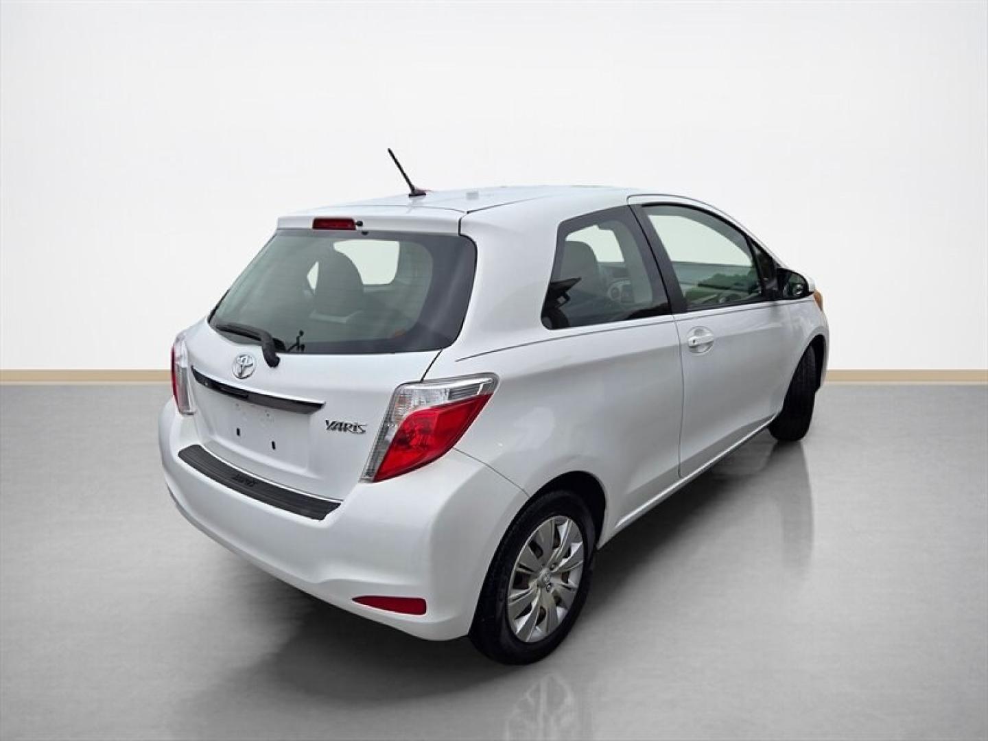 2013 Super White Toyota Yaris L (JTDJTUD36DD) with an 1.5L I4 106hp 103ft. lbs. engine, Automatic transmission, located at 25355 Eames Street, Channahon, IL, 60410, (815) 467-1807, 41.429108, -88.228432 - This 2013 Toyota Yaris 3-Door L offers a reliable and efficient driving experience with its 1.5L I4 engine delivering 106 horsepower and 103 ft-lbs of torque. The exterior is finished in White, complemented by a Gray interior, providing a clean and classic appearance. Equipped with factory standard- Photo#3