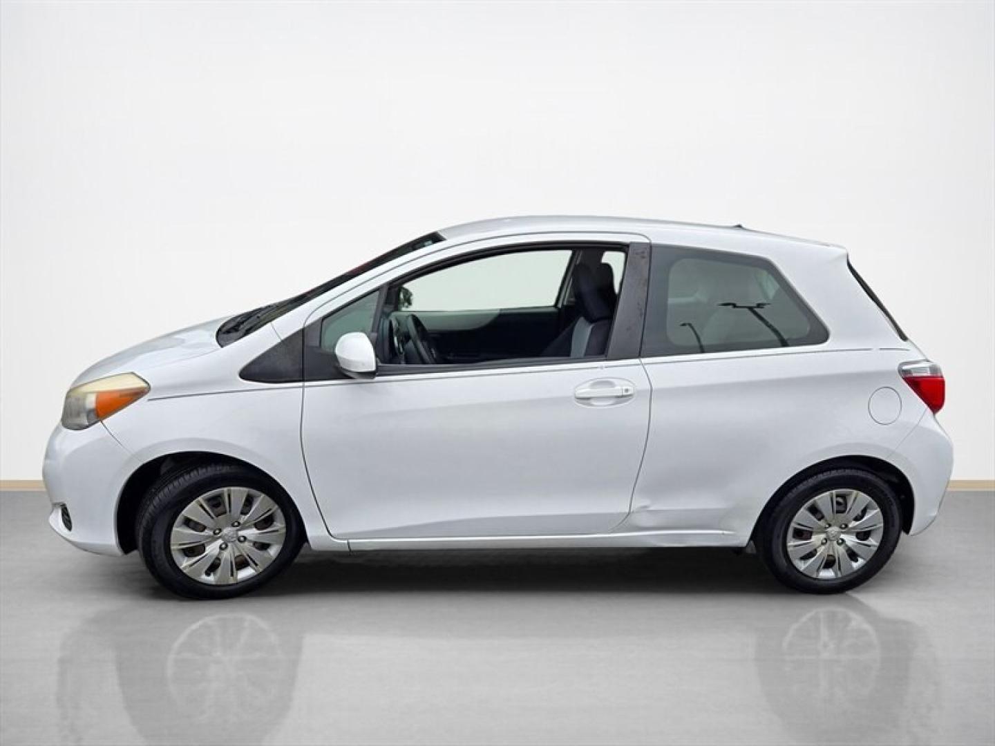 2013 Super White Toyota Yaris L (JTDJTUD36DD) with an 1.5L I4 106hp 103ft. lbs. engine, Automatic transmission, located at 25355 Eames Street, Channahon, IL, 60410, (815) 467-1807, 41.429108, -88.228432 - This 2013 Toyota Yaris 3-Door L offers a reliable and efficient driving experience with its 1.5L I4 engine delivering 106 horsepower and 103 ft-lbs of torque. The exterior is finished in White, complemented by a Gray interior, providing a clean and classic appearance. Equipped with factory standard- Photo#6