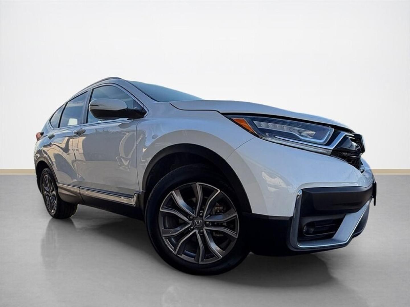 2021 Platinum White Pearl Honda CR-V Touring (7FARW2H9XME) with an 1.5L Turbo I4 190hp 179ft. lbs. engine, Automatic transmission, located at 25355 Eames Street, Channahon, IL, 60410, (815) 467-1807, 41.429108, -88.228432 - The 2021 Honda CR-V Touring is a well-equipped compact SUV that combines performance, comfort, and advanced technology. Powered by a 1.5L Turbocharged Inline-4 engine, it delivers 190 horsepower and 179 lb-ft of torque, providing a balanced blend of power and efficiency. This model achieves an estim- Photo#1