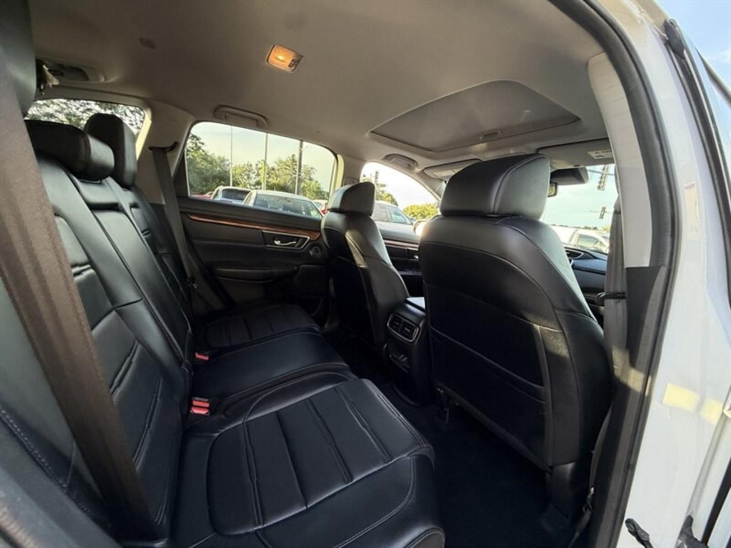 2021 Platinum White Pearl Honda CR-V Touring (7FARW2H9XME) with an 1.5L Turbo I4 190hp 179ft. lbs. engine, Automatic transmission, located at 25355 Eames Street, Channahon, IL, 60410, (815) 467-1807, 41.429108, -88.228432 - The 2021 Honda CR-V Touring is a well-equipped compact SUV that combines performance, comfort, and advanced technology. Powered by a 1.5L Turbocharged Inline-4 engine, it delivers 190 horsepower and 179 lb-ft of torque, providing a balanced blend of power and efficiency. This model achieves an estim- Photo#12