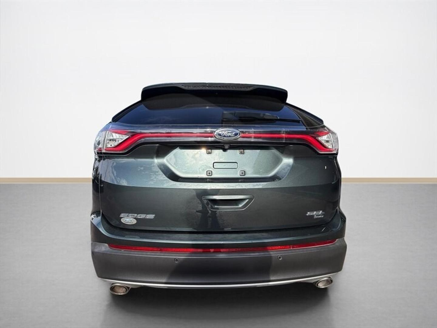 2015 Magnetic Metallic Ford Edge SEL (2FMTK4J8XFB) with an 3.5L V6 280hp 250ft. lbs. engine, Automatic transmission, located at 25355 Eames Street, Channahon, IL, 60410, (815) 467-1807, 41.429108, -88.228432 - 2015 Ford Edge SEL AWD because practical doesnt have to mean painfully boring. This ONE-OWNER, LOCAL TRADE brings the comforts you want with a little attitude to match. Heated leather seats? Obviously. Panoramic roof? Let the sunshine judge your playlist. 3.5L V6 engine All-wheel drive Heated- Photo#4