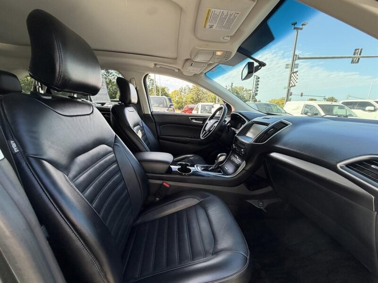2015 Magnetic Metallic Ford Edge SEL (2FMTK4J8XFB) with an 3.5L V6 280hp 250ft. lbs. engine, Automatic transmission, located at 25355 Eames Street, Channahon, IL, 60410, (815) 467-1807, 41.429108, -88.228432 - 2015 Ford Edge SEL AWD because practical doesnt have to mean painfully boring. This ONE-OWNER, LOCAL TRADE brings the comforts you want with a little attitude to match. Heated leather seats? Obviously. Panoramic roof? Let the sunshine judge your playlist. 3.5L V6 engine All-wheel drive Heated- Photo#10