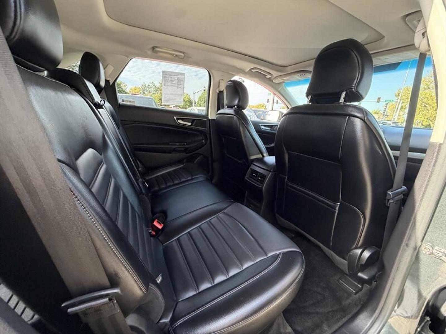2015 Magnetic Metallic Ford Edge SEL (2FMTK4J8XFB) with an 3.5L V6 280hp 250ft. lbs. engine, Automatic transmission, located at 25355 Eames Street, Channahon, IL, 60410, (815) 467-1807, 41.429108, -88.228432 - 2015 Ford Edge SEL AWD because practical doesnt have to mean painfully boring. This ONE-OWNER, LOCAL TRADE brings the comforts you want with a little attitude to match. Heated leather seats? Obviously. Panoramic roof? Let the sunshine judge your playlist. 3.5L V6 engine All-wheel drive Heated- Photo#11
