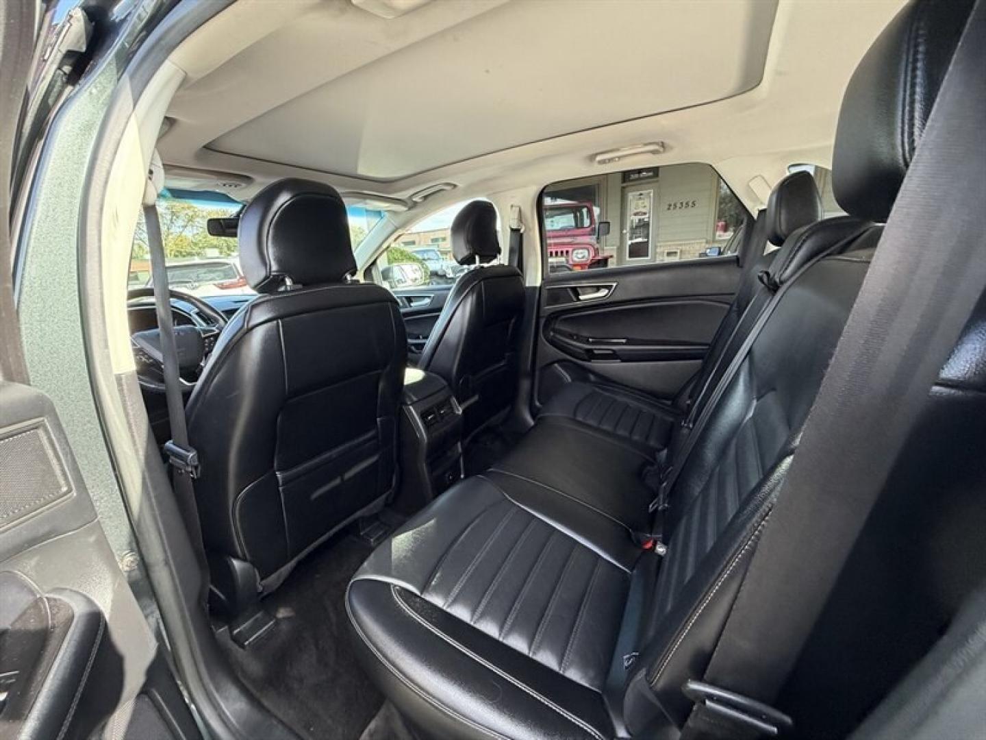 2015 Magnetic Metallic Ford Edge SEL (2FMTK4J8XFB) with an 3.5L V6 280hp 250ft. lbs. engine, Automatic transmission, located at 25355 Eames Street, Channahon, IL, 60410, (815) 467-1807, 41.429108, -88.228432 - 2015 Ford Edge SEL AWD because practical doesnt have to mean painfully boring. This ONE-OWNER, LOCAL TRADE brings the comforts you want with a little attitude to match. Heated leather seats? Obviously. Panoramic roof? Let the sunshine judge your playlist. 3.5L V6 engine All-wheel drive Heated- Photo#13