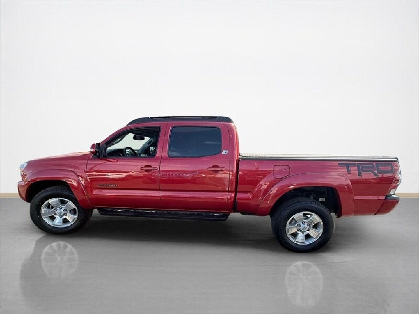2013 Barcelona Red Metallic Toyota Tacoma Base V6 (3TMMU4FN0DM) with an 4.0L V6 236hp 266ft. lbs. engine, Automatic transmission, located at 25355 Eames Street, Channahon, IL, 60410, (815) 467-1807, 41.429108, -88.228432 - Unleash the beast with this 2013 Toyota Tacoma 4x4 Double Cab TRD, a powerhouse crafted for those who demand dominance on and off the road. Under the hood roars a formidable 4.0L V6 engine delivering 236 horsepower and 266 ft-lbs of torquepure, unrelenting power ready to conquer any terrain. Dresse- Photo#6