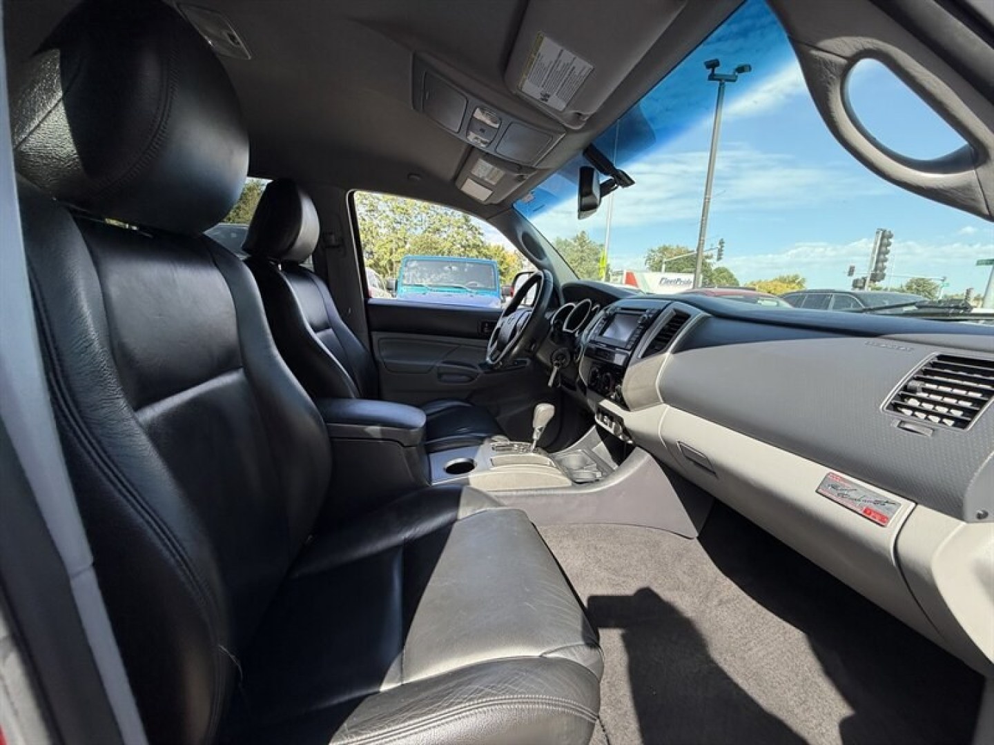 2013 Barcelona Red Metallic Toyota Tacoma Base V6 (3TMMU4FN0DM) with an 4.0L V6 236hp 266ft. lbs. engine, Automatic transmission, located at 25355 Eames Street, Channahon, IL, 60410, (815) 467-1807, 41.429108, -88.228432 - Unleash the beast with this 2013 Toyota Tacoma 4x4 Double Cab TRD, a powerhouse crafted for those who demand dominance on and off the road. Under the hood roars a formidable 4.0L V6 engine delivering 236 horsepower and 266 ft-lbs of torquepure, unrelenting power ready to conquer any terrain. Dresse- Photo#11