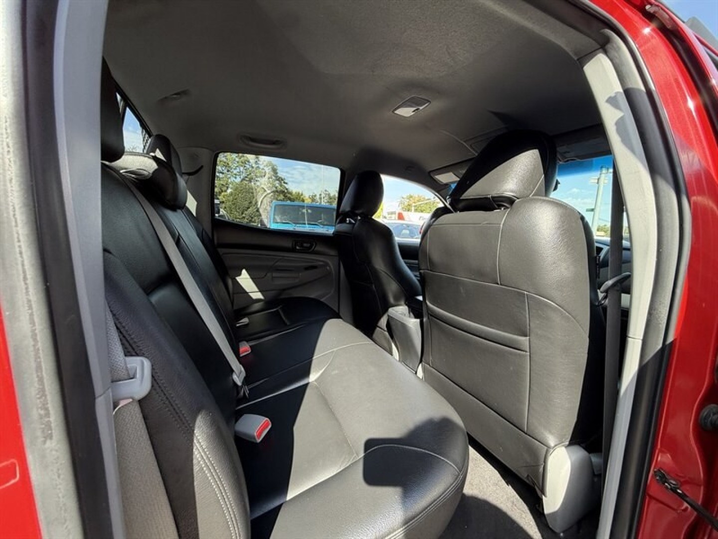 2013 Barcelona Red Metallic Toyota Tacoma Base V6 (3TMMU4FN0DM) with an 4.0L V6 236hp 266ft. lbs. engine, Automatic transmission, located at 25355 Eames Street, Channahon, IL, 60410, (815) 467-1807, 41.429108, -88.228432 - Unleash the beast with this 2013 Toyota Tacoma 4x4 Double Cab TRD, a powerhouse crafted for those who demand dominance on and off the road. Under the hood roars a formidable 4.0L V6 engine delivering 236 horsepower and 266 ft-lbs of torquepure, unrelenting power ready to conquer any terrain. Dresse- Photo#12