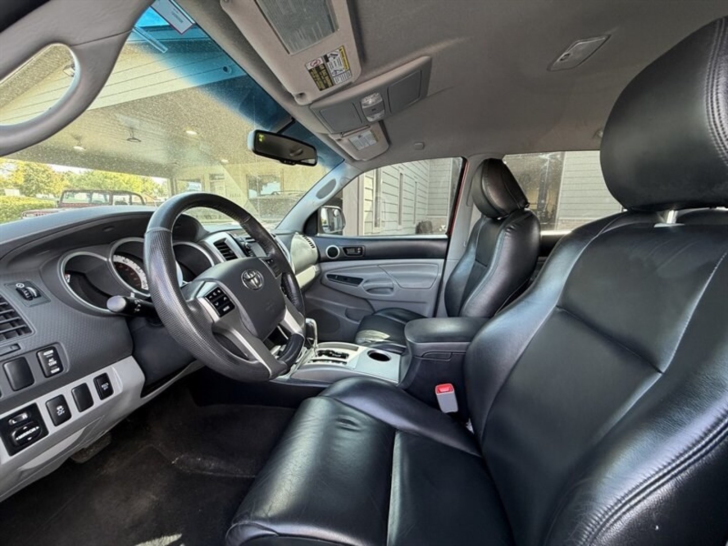 2013 Barcelona Red Metallic Toyota Tacoma Base V6 (3TMMU4FN0DM) with an 4.0L V6 236hp 266ft. lbs. engine, Automatic transmission, located at 25355 Eames Street, Channahon, IL, 60410, (815) 467-1807, 41.429108, -88.228432 - Unleash the beast with this 2013 Toyota Tacoma 4x4 Double Cab TRD, a powerhouse crafted for those who demand dominance on and off the road. Under the hood roars a formidable 4.0L V6 engine delivering 236 horsepower and 266 ft-lbs of torquepure, unrelenting power ready to conquer any terrain. Dresse- Photo#17