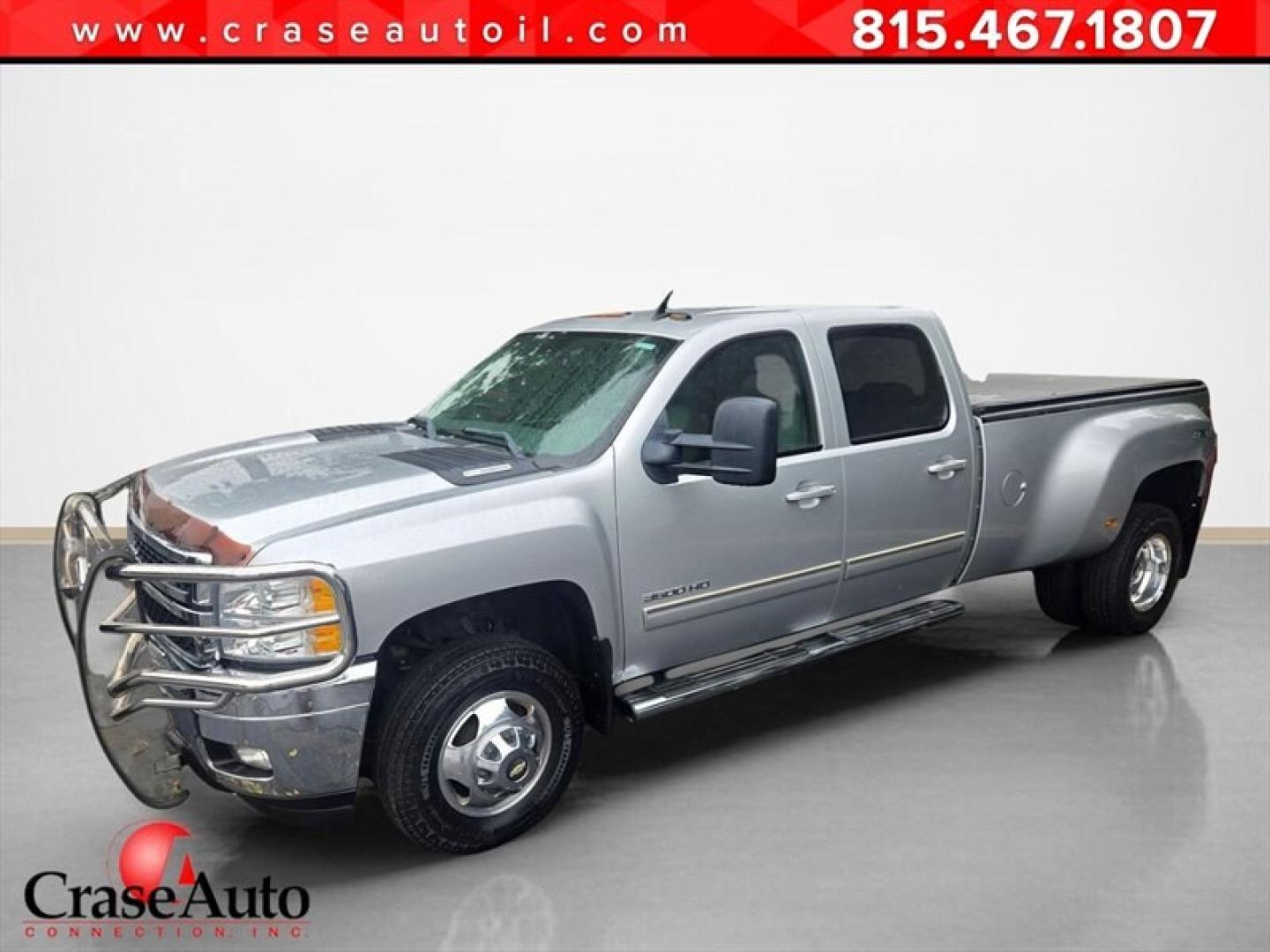 2013 Silver Ice Metallic Chevrolet Silverado 3500 LTZ (1GC4K1C84DF) with an Duramax 6.6L Diesel Turbo V8 397hp 765ft. lbs. engine, Automatic transmission, located at 25355 Eames Street, Channahon, IL, 60410, (815) 467-1807, 41.429108, -88.228432 - Unleash raw power and relentless performance with the 2013 Chevrolet Silverado 3500 LTZ, a true beast built to dominate any challenge. Under the hood roars the legendary Duramax 6.6L Diesel Turbo V8, delivering an unstoppable 397 horsepower and a massive 765 ft-lbs of torque. This isnt just a trucki- Photo#0