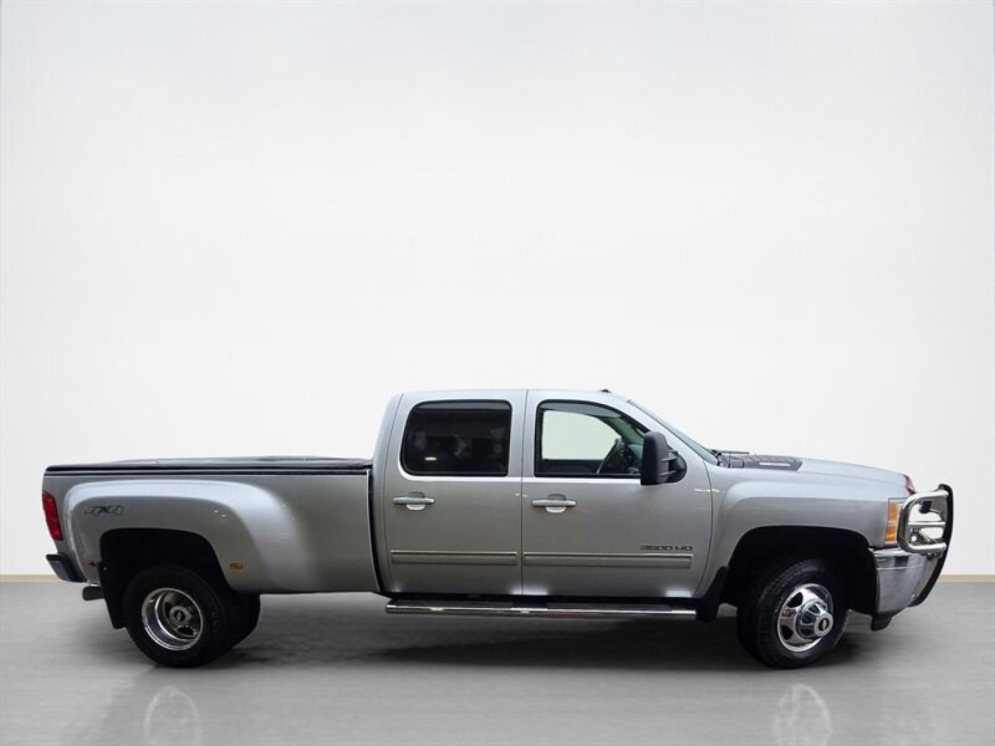 2013 Silver Ice Metallic Chevrolet Silverado 3500 LTZ (1GC4K1C84DF) with an Duramax 6.6L Diesel Turbo V8 397hp 765ft. lbs. engine, Automatic transmission, located at 25355 Eames Street, Channahon, IL, 60410, (815) 467-1807, 41.429108, -88.228432 - Unleash raw power and relentless performance with the 2013 Chevrolet Silverado 3500 LTZ, a true beast built to dominate any challenge. Under the hood roars the legendary Duramax 6.6L Diesel Turbo V8, delivering an unstoppable 397 horsepower and a massive 765 ft-lbs of torque. This isnt just a trucki- Photo#3