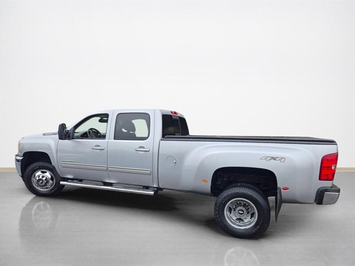 2013 Silver Ice Metallic Chevrolet Silverado 3500 LTZ (1GC4K1C84DF) with an Duramax 6.6L Diesel Turbo V8 397hp 765ft. lbs. engine, Automatic transmission, located at 25355 Eames Street, Channahon, IL, 60410, (815) 467-1807, 41.429108, -88.228432 - Unleash raw power and relentless performance with the 2013 Chevrolet Silverado 3500 LTZ, a true beast built to dominate any challenge. Under the hood roars the legendary Duramax 6.6L Diesel Turbo V8, delivering an unstoppable 397 horsepower and a massive 765 ft-lbs of torque. This isnt just a trucki- Photo#7