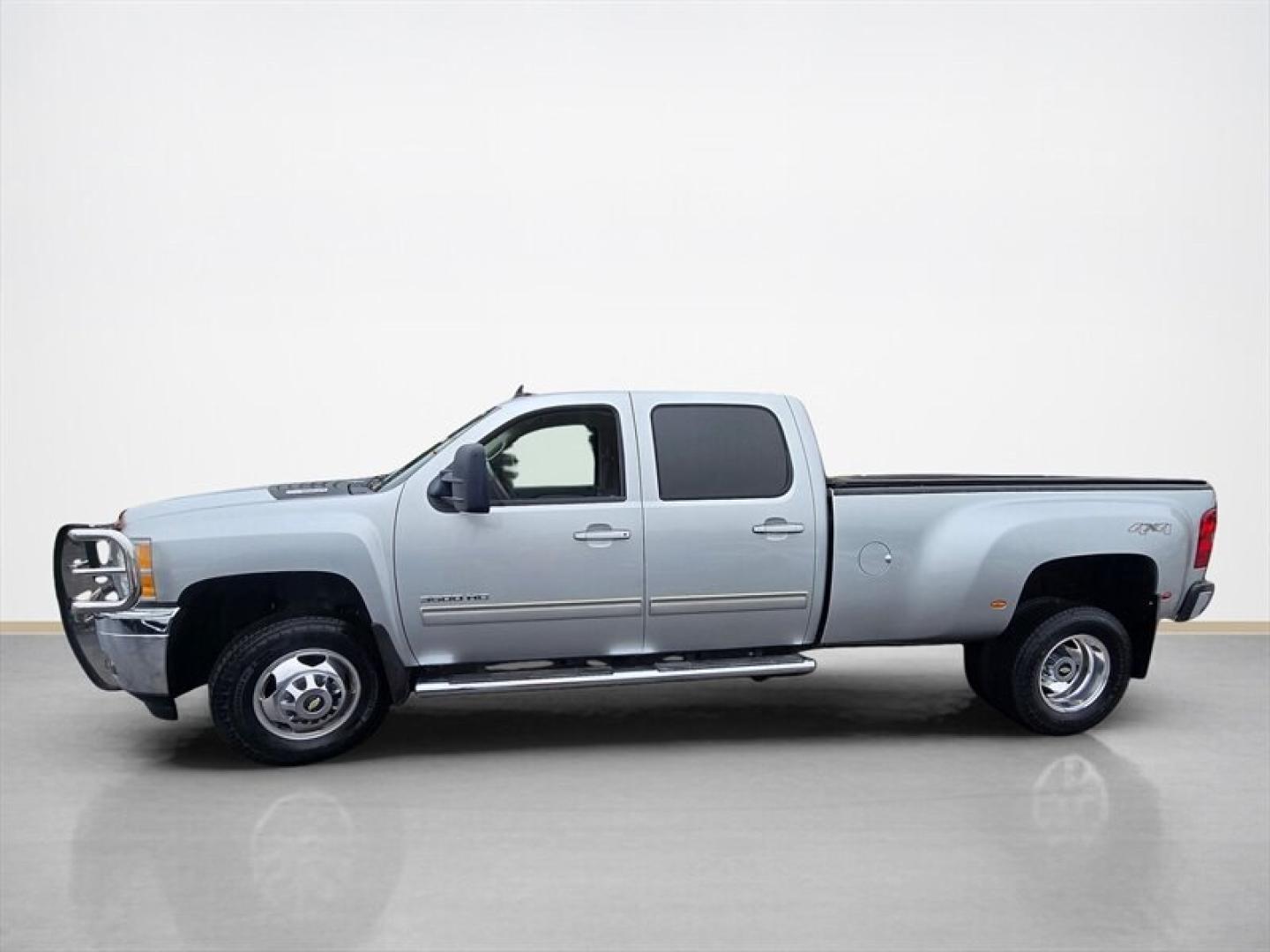 2013 Silver Ice Metallic Chevrolet Silverado 3500 LTZ (1GC4K1C84DF) with an Duramax 6.6L Diesel Turbo V8 397hp 765ft. lbs. engine, Automatic transmission, located at 25355 Eames Street, Channahon, IL, 60410, (815) 467-1807, 41.429108, -88.228432 - Unleash raw power and relentless performance with the 2013 Chevrolet Silverado 3500 LTZ, a true beast built to dominate any challenge. Under the hood roars the legendary Duramax 6.6L Diesel Turbo V8, delivering an unstoppable 397 horsepower and a massive 765 ft-lbs of torque. This isnt just a trucki- Photo#8