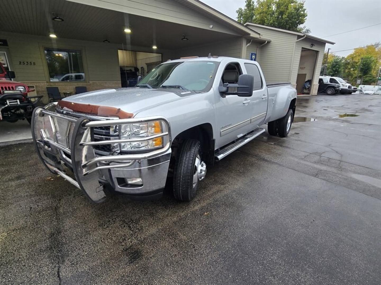 2013 Silver Ice Metallic Chevrolet Silverado 3500 LTZ (1GC4K1C84DF) with an Duramax 6.6L Diesel Turbo V8 397hp 765ft. lbs. engine, Automatic transmission, located at 25355 Eames Street, Channahon, IL, 60410, (815) 467-1807, 41.429108, -88.228432 - Unleash raw power and relentless performance with the 2013 Chevrolet Silverado 3500 LTZ, a true beast built to dominate any challenge. Under the hood roars the legendary Duramax 6.6L Diesel Turbo V8, delivering an unstoppable 397 horsepower and a massive 765 ft-lbs of torque. This isnt just a trucki- Photo#9