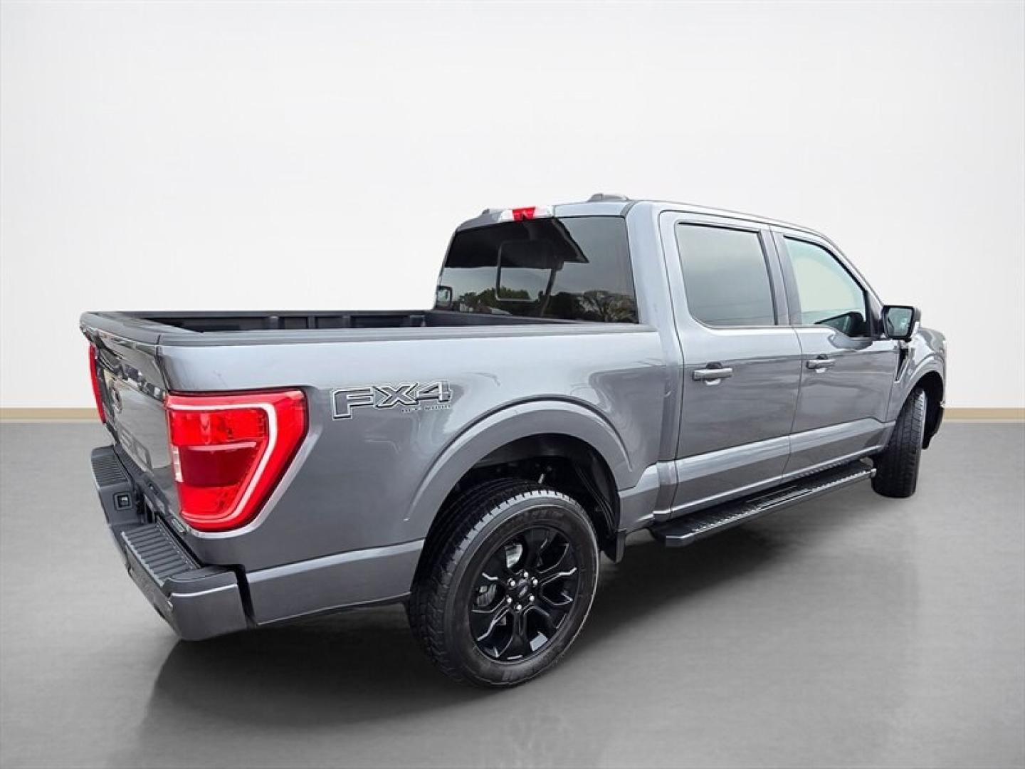 2022 Carbonized Gray Ford F-150 XLT (1FTFW1E89NF) with an EcoBoost 3.5L Twin Turbo V6 400hp 500ft. lbs. engine, Automatic transmission, located at 25355 Eames Street, Channahon, IL, 60410, (815) 467-1807, 41.429108, -88.228432 - 2022 FORD F-150 XLT SUPERCREW 4X4 OVER $11,000 IN EXTRA FACTORY OPTIONS! Some trucks come with the basics. This one checked the upgrade boxes. 3.5L EcoBoost V6 with 10-speed automatic XLT Black Appearance Package with 20" gloss-black wheels Black leather-trimmed seats Twin-panel moonroof FX4- Photo#3