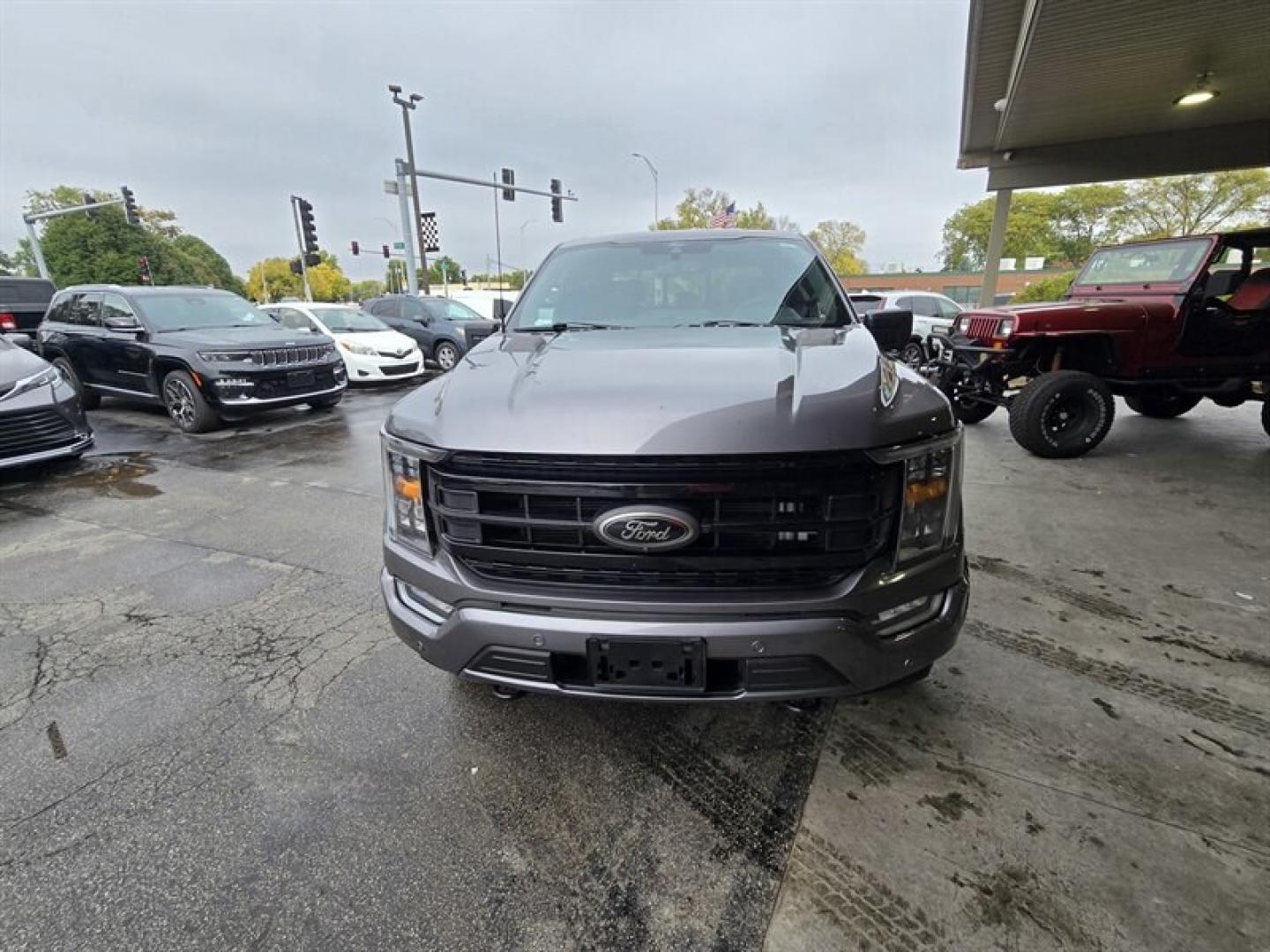 2022 Carbonized Gray Ford F-150 XLT (1FTFW1E89NF) with an EcoBoost 3.5L Twin Turbo V6 400hp 500ft. lbs. engine, Automatic transmission, located at 25355 Eames Street, Channahon, IL, 60410, (815) 467-1807, 41.429108, -88.228432 - 2022 FORD F-150 XLT SUPERCREW 4X4 OVER $11,000 IN EXTRA FACTORY OPTIONS! Some trucks come with the basics. This one checked the upgrade boxes. 3.5L EcoBoost V6 with 10-speed automatic XLT Black Appearance Package with 20" gloss-black wheels Black leather-trimmed seats Twin-panel moonroof FX4- Photo#9