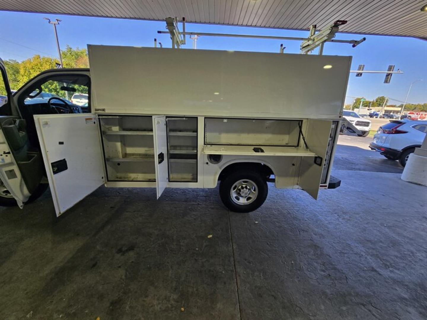 2019 White Chevrolet Express Work Van Cutaway (1GB0GRFG3K1) with an Vortec 6.0L Flex Fuel V8 341hp 373ft. lbs. engine, Automatic transmission, located at 25355 Eames Street, Channahon, IL, 60410, (815) 467-1807, 41.429108, -88.228432 - ** 12 FOOT KNAPHEIDE KUV PLUMBERS BODY. **The 2019 Chevrolet Express 3500 is equipped with a robust Vortec 6.0L Flex Fuel V8 engine, delivering 341 horsepower and 373 lb-ft of torque, providing reliable performance for a variety of driving needs. The exterior features a clean White finish, complemen- Photo#28