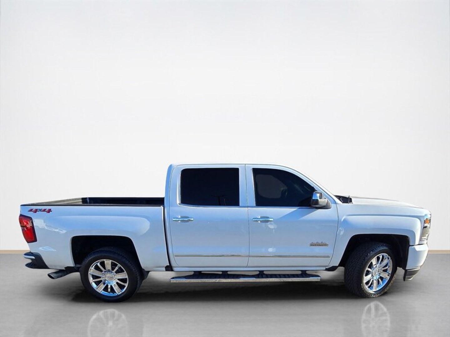 2018 Iridescent Pearl Tricoat Chevrolet Silverado 1500 High Country (3GCUKTEJ0JG) with an 6.2 engine, Automatic transmission, located at 25355 Eames Street, Channahon, IL, 60410, (815) 467-1807, 41.429108, -88.228432 - This 2018 Chevrolet Silverado 1500 High Country is a well-maintained full-size pickup truck featuring a robust 6.2L V8 engine. The exterior is finished in a crisp White color, complemented by a Saddle-colored interior that offers a refined and comfortable cabin environment. Factory features include- Photo#1
