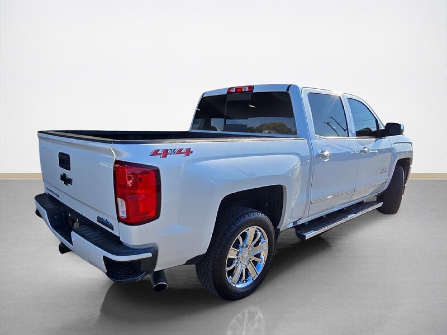 2018 Iridescent Pearl Tricoat Chevrolet Silverado 1500 High Country (3GCUKTEJ0JG) with an 6.2 engine, Automatic transmission, located at 25355 Eames Street, Channahon, IL, 60410, (815) 467-1807, 41.429108, -88.228432 - This 2018 Chevrolet Silverado 1500 High Country is a well-maintained full-size pickup truck featuring a robust 6.2L V8 engine. The exterior is finished in a crisp White color, complemented by a Saddle-colored interior that offers a refined and comfortable cabin environment. Factory features include- Photo#3