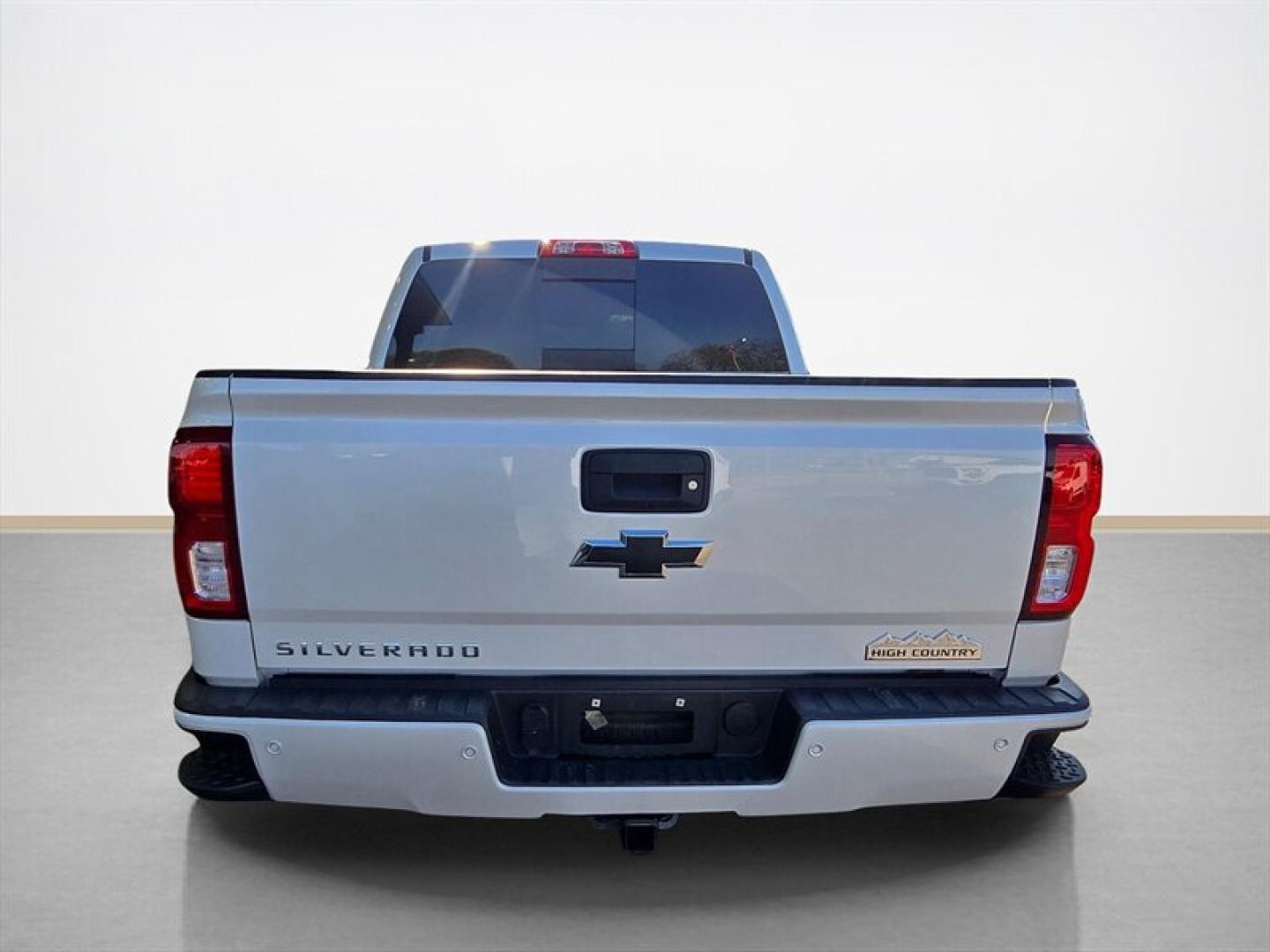 2018 Iridescent Pearl Tricoat Chevrolet Silverado 1500 High Country (3GCUKTEJ0JG) with an 6.2 engine, Automatic transmission, located at 25355 Eames Street, Channahon, IL, 60410, (815) 467-1807, 41.429108, -88.228432 - This 2018 Chevrolet Silverado 1500 High Country is a well-maintained full-size pickup truck featuring a robust 6.2L V8 engine. The exterior is finished in a crisp White color, complemented by a Saddle-colored interior that offers a refined and comfortable cabin environment. Factory features include- Photo#4